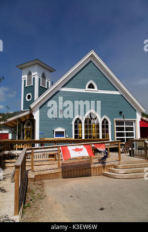 Zeichen für die Buddha tragen Kaffeeröster in Alma New Brunswick, Kanada. Handwerk Bier und Kaffee ist in einer ehemaligen Kirche serviert. Stockfoto