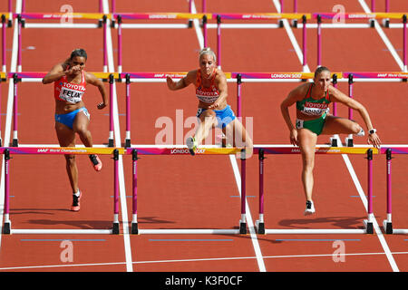 Xénia KRIZSÁN (Ungarn), Nadine BROERSEN (Niederlande, Holland), Alysbeth FELIX (Puerto Rico) im Siebenkampf 100 m Hürden Wärme 2 2017 konkurrieren, IAAF Weltmeisterschaften, Queen Elizabeth Olympic Park, Stratford, London, UK. Stockfoto