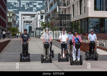 Segwaytour durch den Rheinauhafen (Rheinauer Hafen), Köln, Nordrhein-Westfalen, Deutschland Stockfoto