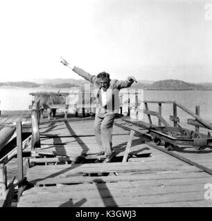 Die MAGGIE PAUL DOUGLAS fällt durch die faulen Pier der Maggie Datum: 1954 Stockfoto
