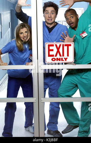SCRUBS -- NBC Series -- abgebildet: Sarah Chalke als Elliott Reid, Zach Braff als John J.D. Dorian, Donald Faison als Chris Turk -- NBC Photo: Chris Haston SCRUBS Series#1 Stockfoto