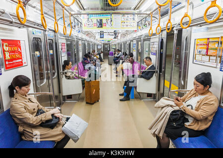 Japan, Hoshu, Tokio, Bahnreisende Stockfoto