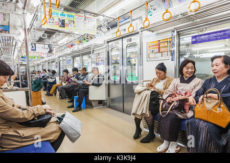 Japan, Hoshu, Tokio, Bahnreisende Stockfoto