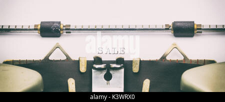Close-up Wort Verkauf auf einer Schreibmaschine Blatt Stockfoto