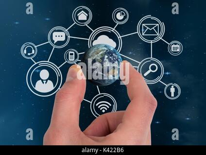 Digital composite von Hand mit einem Globus mit Stecker Stockfoto