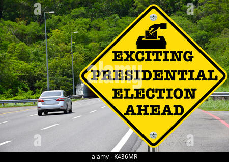 Spannende Präsidentenwahl vor, gelb Warnung street sign Stockfoto