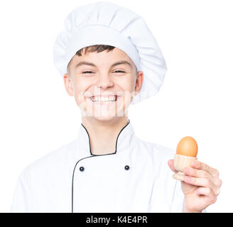 Teenboy tragen Chef uniform Stockfoto