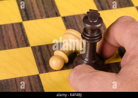 Bauern opfern, eine konzeptionelle Schuß auf Machtmissbrauch Stockfoto