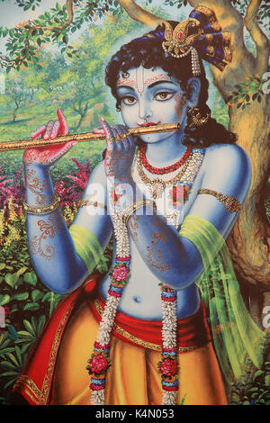 Gemälde der Darstellung Hindu Gott Krishna Flöte spielen im Freien, Vrindavan, Uttar Pradesh, Indien, Asien Stockfoto