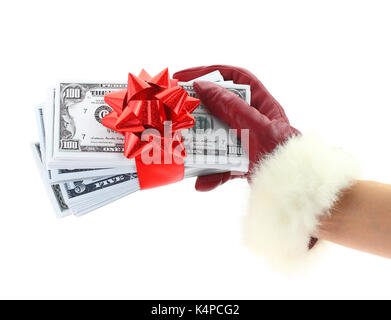 Woman's Hand mit roten Handschuh holding Geschenk des Geldes Stockfoto