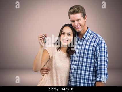 Digital composite von Paar Gedrückthalten der Taste vor Vignette Stockfoto