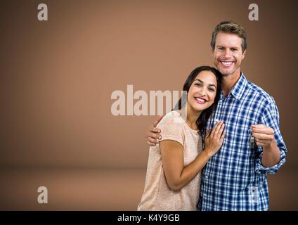 Digital composite von Paar Gedrückthalten der Taste vor Vignette Stockfoto
