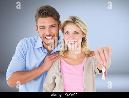 Digital composite von Paar Gedrückthalten der Taste vor Vignette Stockfoto