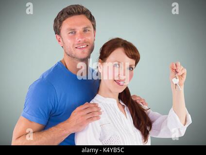 Digital composite von Paar Gedrückthalten der Taste vor Vignette Stockfoto