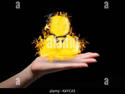 Digital composite von Hand mit Kontakt Feuer Symbol über. Schwarzer Hintergrund Stockfoto