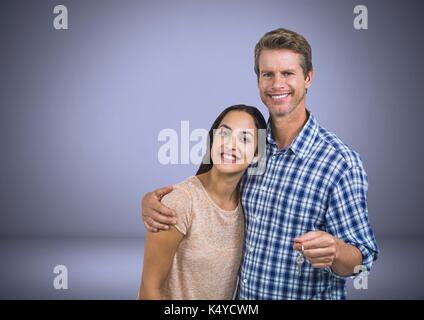 Digital composite von Paar Gedrückthalten der Taste vor Vignette Stockfoto