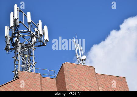 Transformer on top of a house Stockfoto