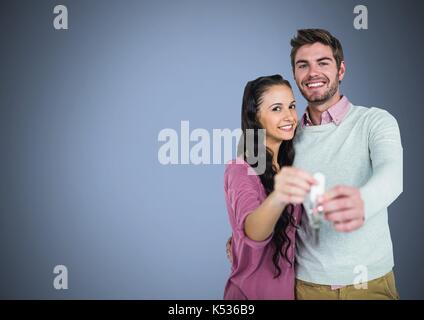 Digital composite von Paar Gedrückthalten der Taste vor Vignette Stockfoto