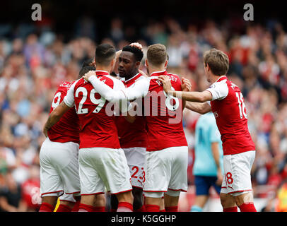 London, Großbritannien. 9 Sep, 2017. Spieler von Arsenal feiern ihr erstes Ziel in der englischen Premier League Spiel zwischen Arsenal und Bournemouth im Emirates Stadium in London, Großbritannien an Sept. 9, 2017. Credit: Han Yan/Xinhua/Alamy leben Nachrichten Stockfoto