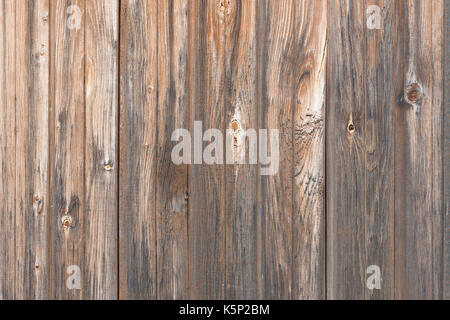 Im Stil einer rustikalen von alten hölzernen unlackierten Bretter mit Knoten Hintergrund Stockfoto