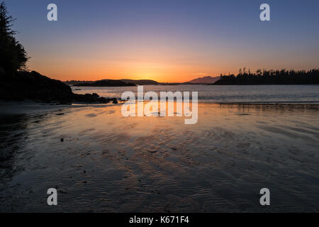 Sonnenuntergang auf Mackenzie Beach, Tofino, Vancouver Island Stockfoto