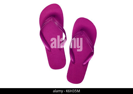 Rosa-lila Gummi Flip Flops, auf weißem Hintergrund. Stockfoto