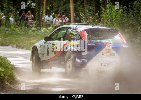 Ex-Carlos Sainz 2001 Ford Focus WRC mit Fahrer David Wright auf der Kundgebung der Bühne im Jahr 2017 Goodwwod Festival der Geschwindigkeit, Sussex, UK. Stockfoto