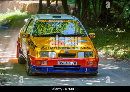 1986 Ford Sierra RS Cosworth Rally Car auf der Waldbühne mit Fahrer Jason Lepley am Goodwood Festival 2017 von Geschwindigkeit, Sussex, UK. Stockfoto