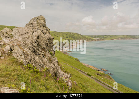 Suchen vom Startpunkt entlang der Küste der Bucht zu Hallsands - South Devon, Großbritannien. Stockfoto