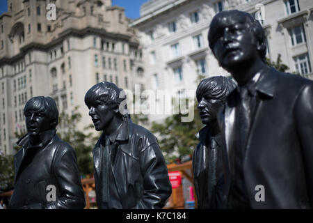 Die Beatles statue am Mersey Docks in Liverpool, England, am 15. September 2017. Stockfoto