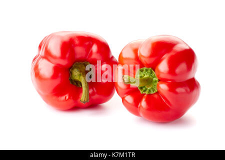 Zwei reife rote Paprika über Weiß Stockfoto