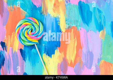 Lollipop candy auf einen farbigen Hintergrund Stockfoto