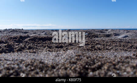 Nahaufnahme des Sandes auf einem Kurs Sandstrand Stockfoto
