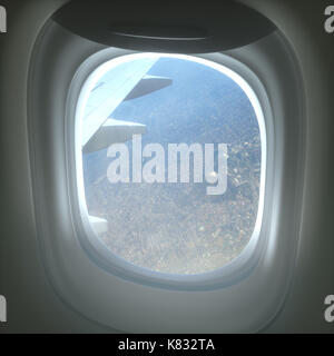 Blick aus dem Flugzeug heraus, durch das offene Fenster. Stockfoto