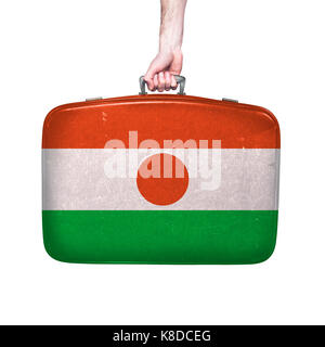 Niger Flagge auf einem Vintage Leder Koffer. Stockfoto