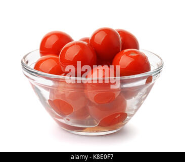 Eingelegte Tomaten in Glas Schüssel solated auf Weiß Stockfoto