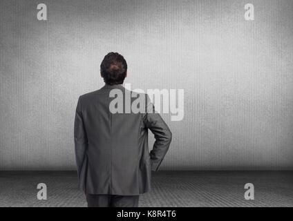 Digital composite der Geschäftsmann und grauer Hintergrund Stockfoto