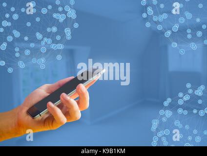 Digital composite von Hand mit Telefon mit Stecker Stockfoto