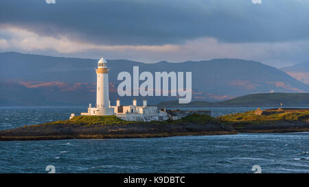 Eilean Musdile Leuchtturm auf einer kleinen Insel an der äußersten Südspitze der Insel Lismore im Firth von Lorne auf der Fährstrecke zwischen O entfernt Stockfoto