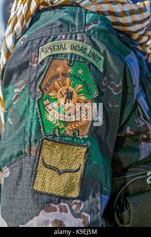 Schulter Patch der Philippinischen Nationalpolizei speziellen Boot Einheit, SBU, von einem Polizisten in Puerto Princesa, Palawan, Philippinen getragen. Stockfoto