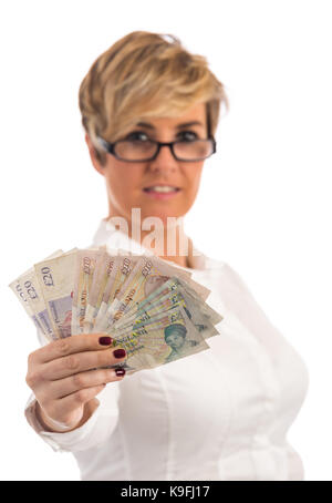 Eine erfolgreiche Geschäftsfrau mit einer Handvoll cash Stockfoto