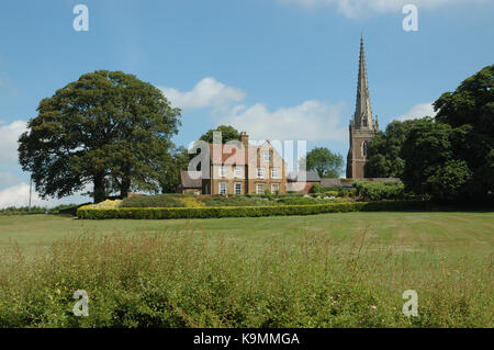 Braunston Manor, und braunston Kirche, Braunston, Northamptonshire, England, Vereinigtes Königreich. Stockfoto