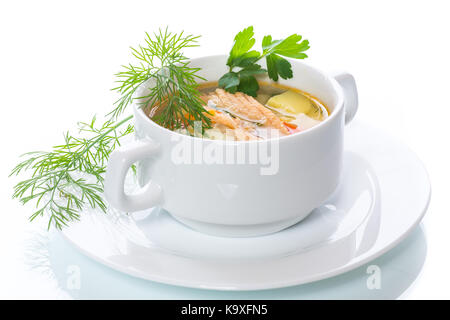 Fischsuppe mit Gemüse in einer Platte Stockfoto