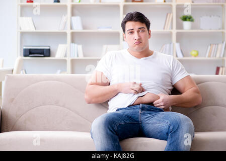 Menschen leiden an Magen und Erbrechen Stockfoto