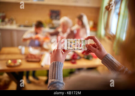 Weihnachten Familie-mobile Fotografieren portrait Stockfoto
