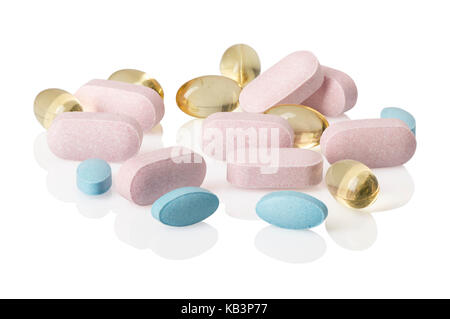 Ein Haufen von Pillen und oder Vitamine auf Weiß mit Reflexion. Stockfoto