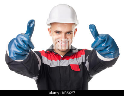 Portrait der junge lächelnde Arbeiter in Schutzhandschuhe Daumen oben auf weißem Hintergrund Stockfoto