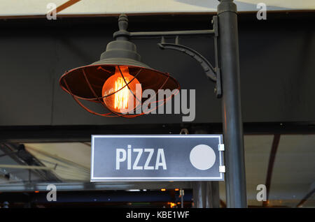 Pizza road Vintage singen Stadt Zeichen Stockfoto