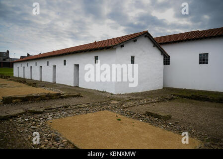 Arbeia war ein großer Roman Fort in South Shields, Tyne and Wear, England, jetzt ruiniert, und das ist teilweise rekonstruiert worden. Stockfoto