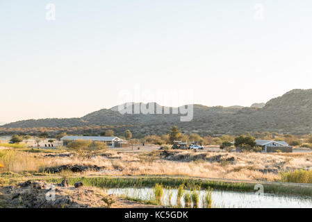 GROSS BARMEN, NAMIBIA - Juli 3, 2017: Sonnenuntergang Blick auf dem Campingplatz in Gross Barmen, in der Nähe von Okahandja in der Kavango Region von Namibia Stockfoto